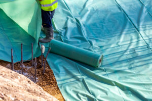 installing-polyethylene-film-barrier-before-pourin-2026-01-11-09-31-06-utc